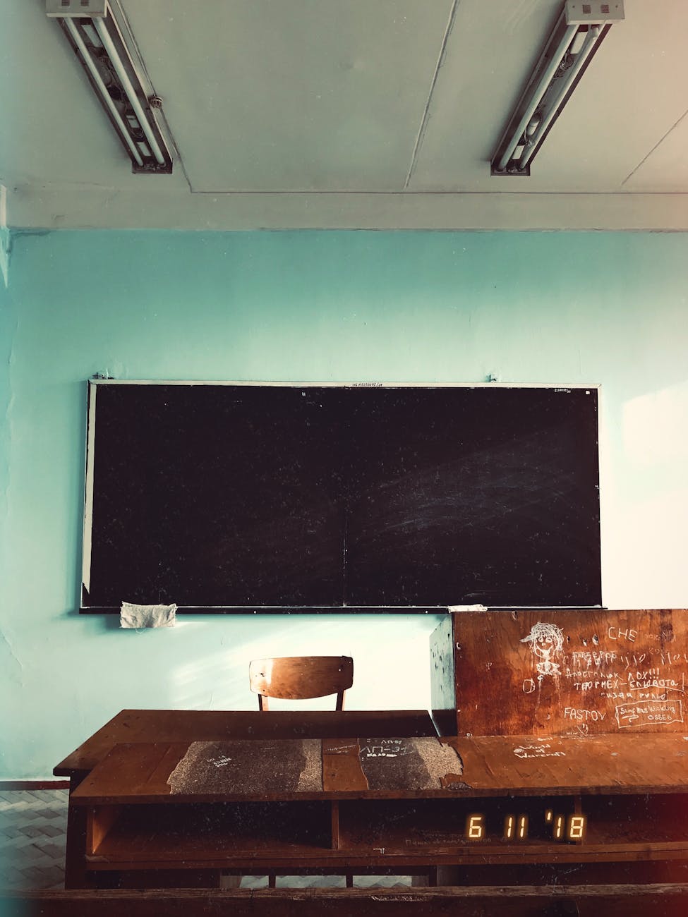 old classroom with empty blackboard